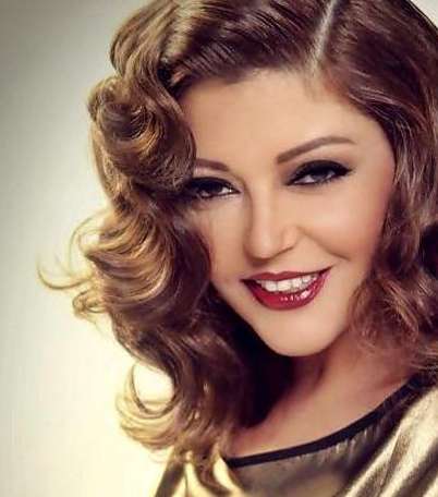 إطلالات شعر وماكياج سميرة سعيد 